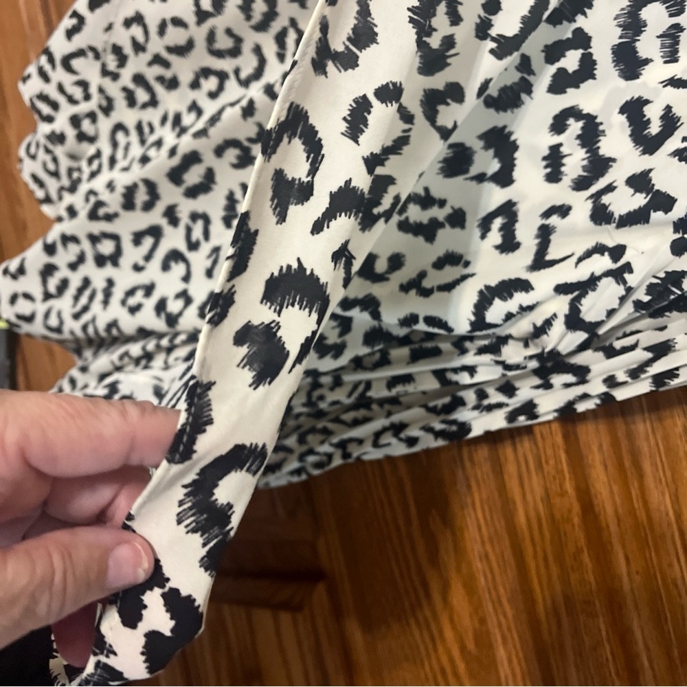 Laurie Felt Blouse Black and Cream Leopard Print  Accordion sleeves. Layered